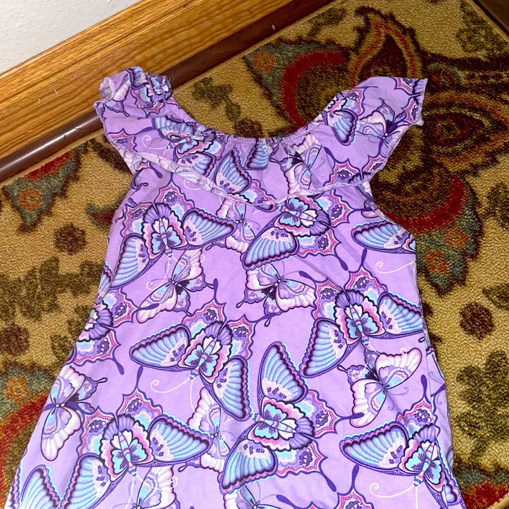 This is a butterfly shirt it is purple and beautiful!